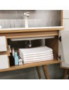 Space saving connecting pipe inside bathroom furniture for more storage space.