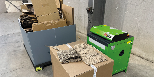 A new machine to eliminate plastic cushioning and reuse used cardboard boxes